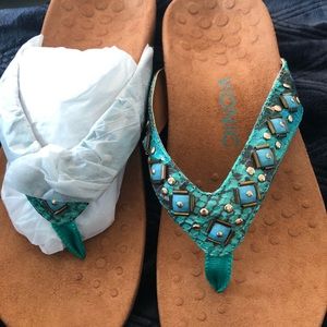 Teal snake and teal stones